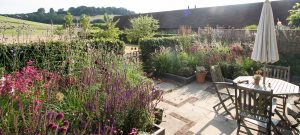 barn conversion garden tough growing conditions climate resiliant planting