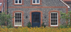 flint house architecture annual wildflower meadow