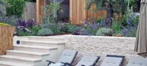 stone clad wall contemporary garden design mediterranean planting design home office garden office ideas brighton garden design brighton garden office brighton home office